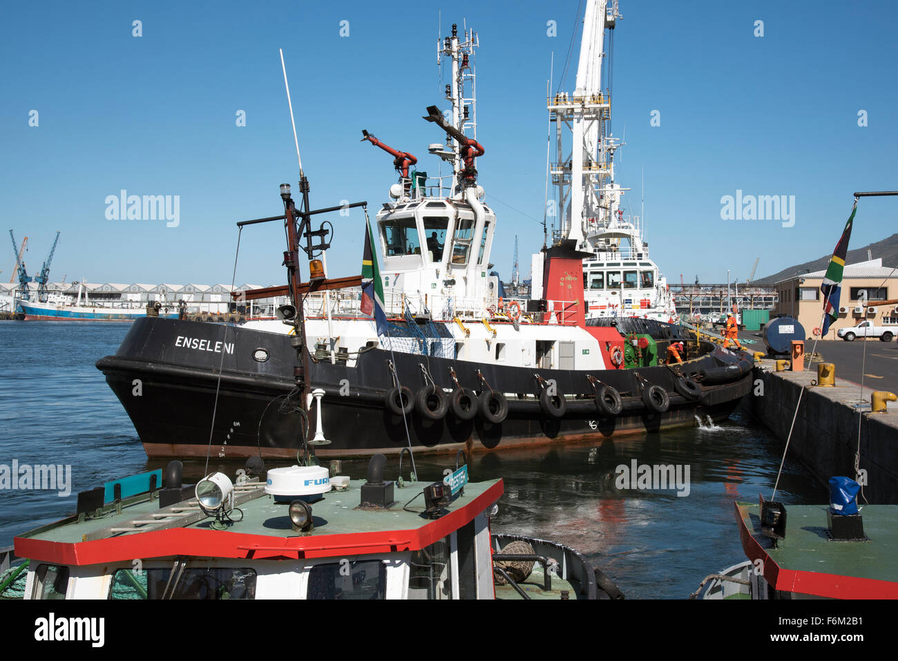 Ocean going tug Enseleni leaving her berth in Cape Town harbour South Africa Stock Photo
