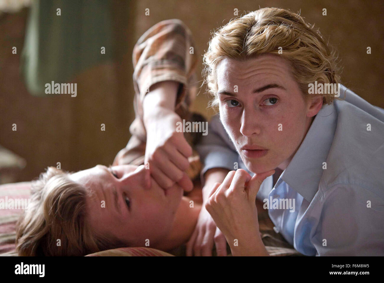 RELEASE DATE: January 9, 2009 . MOVIE TITLE: The Reader. STUDIO: The Weinstein Company. PLOT: In postwar Germany, a young man's decades-long obsession with an older woman runs headlong into a war crimes trial, where he learns an awful truth. PICTURED: KATE WINSLET as Hanna Schmitz and DAVID KROSS as Michael. Stock Photo