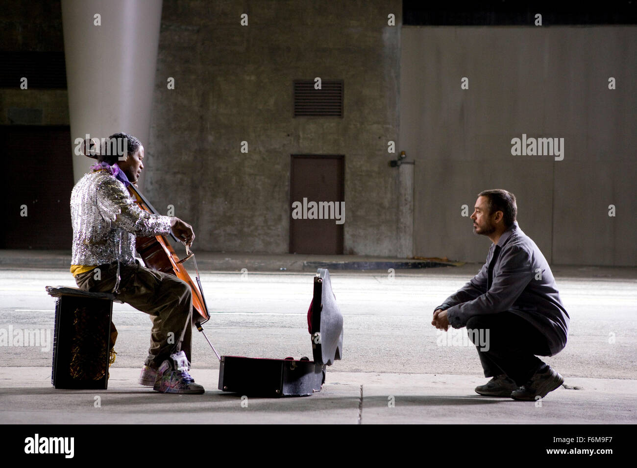 RELEASE DATE: April 24, 2009. MOVIE TITLE: The Soloist. STUDIO: Paramount Pictures. PLOT: A Los Angeles Journalist, befriends a homeless Julliard trained musician, while looking for a new article for the paper. PICTURED: JAMIE FOXX as Nathaniel Ayers and ROBERT DOWNEY as Steve Lopez. Stock Photo