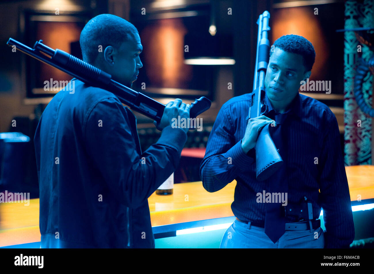 RELEASE DATE: February 26, 2010. MOVIE TITLE: Takers. STUDIO: Screen Gems. PLOT: A group of bank robbers find their 0 million plan interrupted by a hard-boiled detective. PICTURED: CHRIS BROWN (left) and MICHAEL EALY Stock Photo