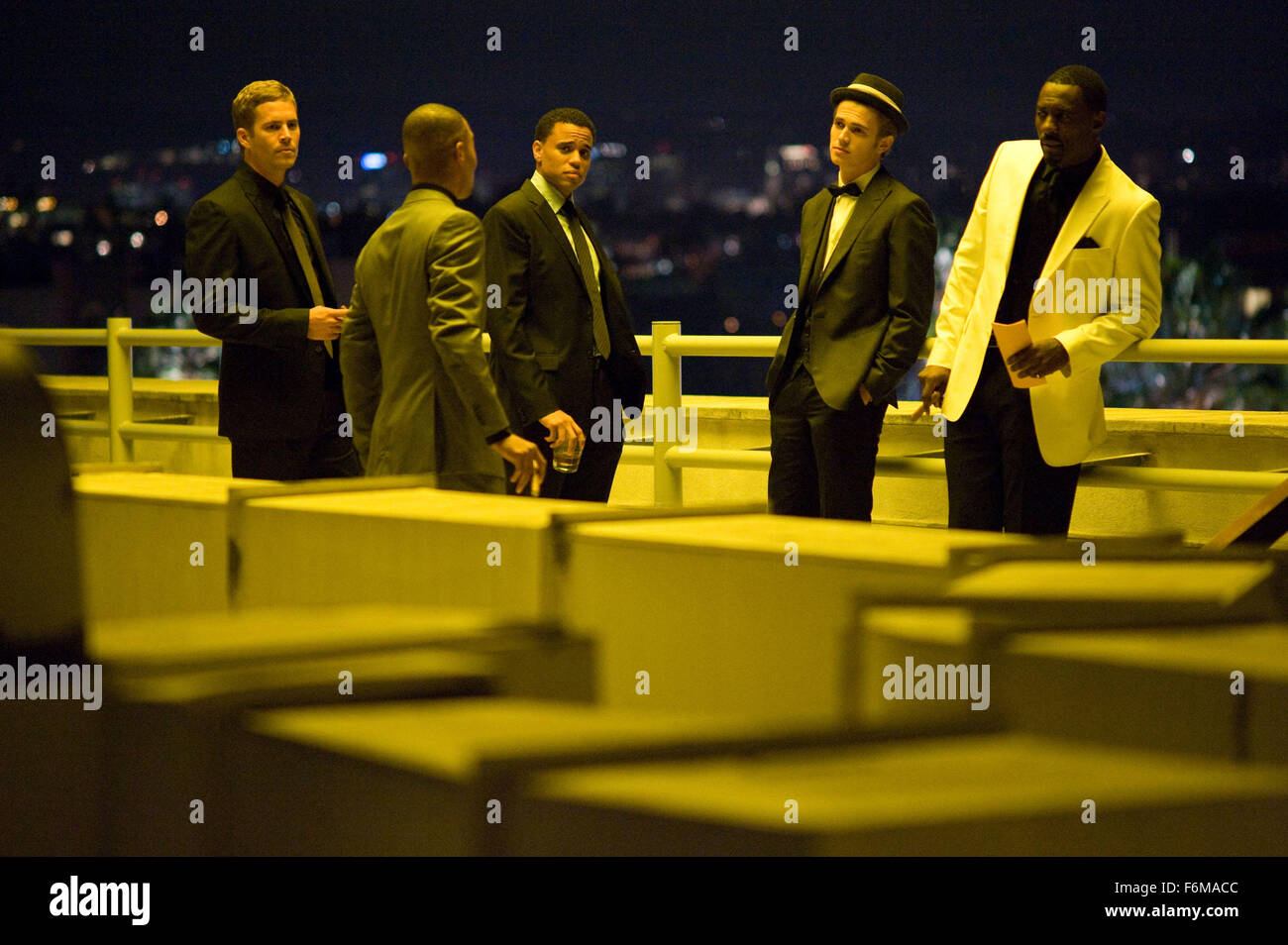 RELEASE DATE: February 26, 2010. MOVIE TITLE: Takers. STUDIO: Screen Gems. PLOT: A group of bank robbers find their 0 million plan interrupted by a hard-boiled detective. PICTURED: (L to R) PAUL WALKER, T.I., MICHAEL EALY, HAYDEN CHRISTENSEN and IDRIS ELBA. Stock Photo