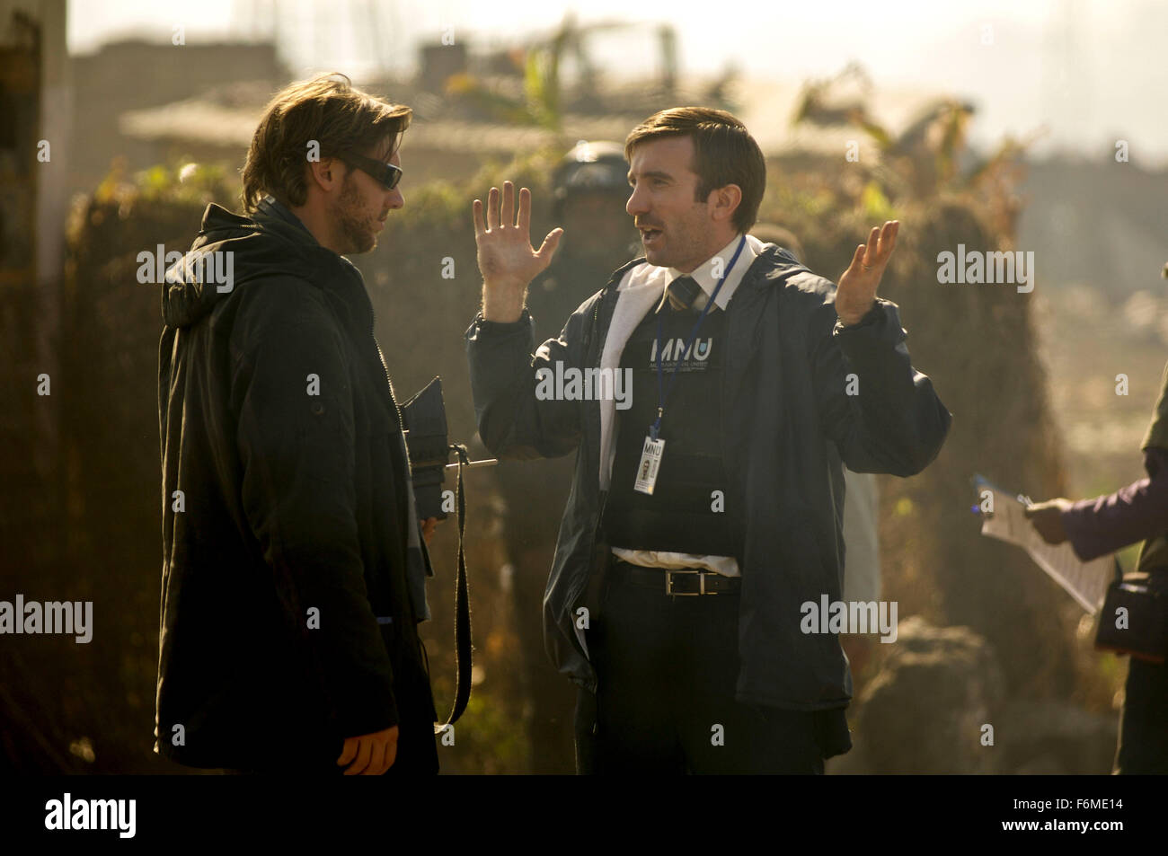 RELEASE DATE: August 19, 2009. MOVIE TITLE: District 9. STUDIO: TriStar Pictures. PLOT: An extraterrestrial race forced to live in slum-like conditions on Earth suddenly finds a kindred spirit in a government agent who is exposed to their biotechnology. PICTURED: Director NEILL BLOMKAMP (left) and SHARLTO COPLEY as Wikus Van De Merwe Stock Photo