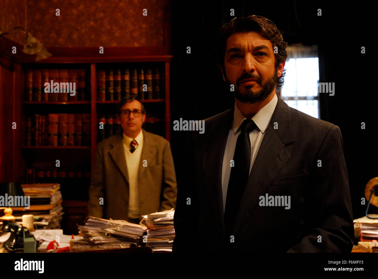 RELEASE DATE: April 11, 2009. MOVIE TITLE: The Secret in their Eyes. STUDIO: 100 Bares. PLOT: A man wants to solve a murder committed many years ago. PICTURED: GUILLERMO FRANCELLA as Sandoval, RICARDO DARIN as Benajmin Esposito. Stock Photo