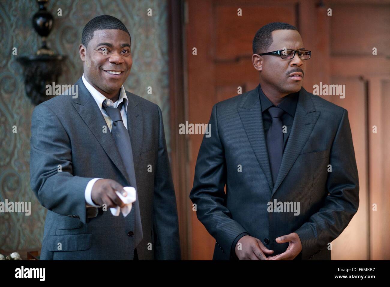 RELEASE DATE: April 16, 2010. MOVIE TITLE: Death At A Funeral. STUDIO: Parabolic Pictures Inc. PLOT: A funeral ceremony turns into a debacle of exposed family secrets and misplaced bodies. PICTURED: TRACY MORGAN as Norman and MARTIN LAWRENCE as Ryan. Stock Photo