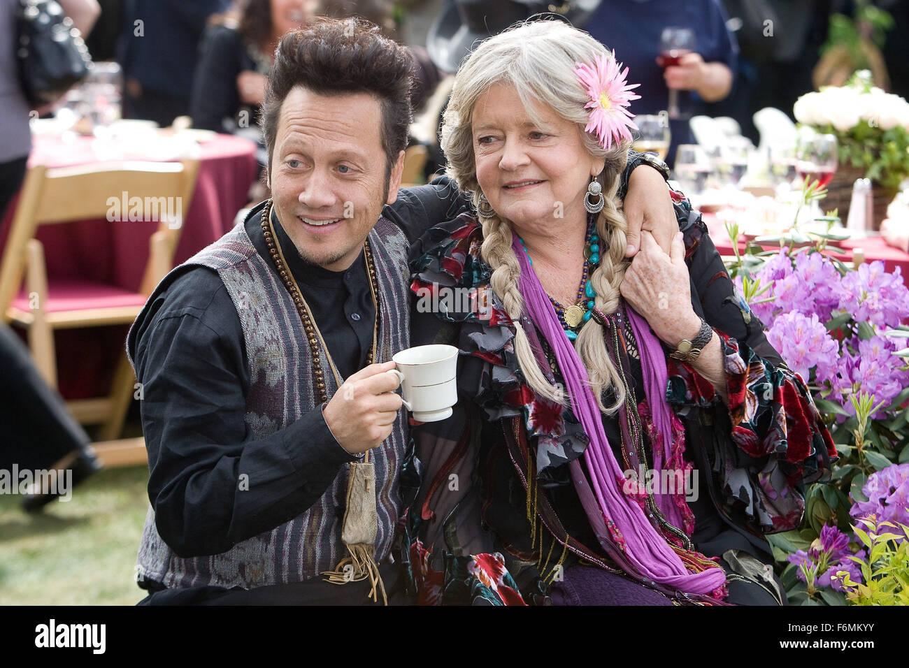 RELEASE DATE: June 25, 2010. MOVIE TITLE: Grown Ups. STUDIO: Columbia Pictures. PLOT: Thirty years after their high school graduation, five good friends reunite for a Fourth of July holiday weekend. PICTURED: ROB SCHNEIDER as Rob Hilliard and JOYCE VAN PATTEN as Gloria. Stock Photo