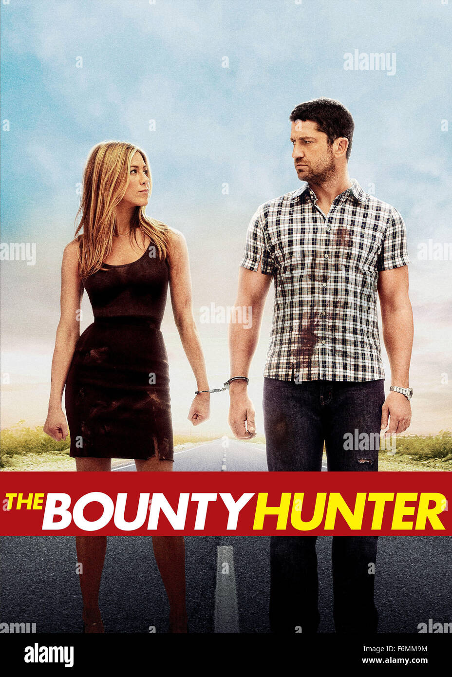 RELEASE DATE: March 19, 2010   MOVIE TITLE: The Bounty Hunter   STUDIO: Columbia Pictures   DIRECTOR: Andy Tennant  PLOT: A bounty hunter learns that his next target is his ex-wife, a reporter working on a murder cover-up. Soon after their reunion, the always-at-odds duo find themselves on a run-for-their-lives adventure   PICTURED: JENNIFER ANISTON as Nicole Hurley and GERARD BUTLER as Milo Boyd   (Credit Image: c Columbia Pictures/Entertainment Pictures) Stock Photo