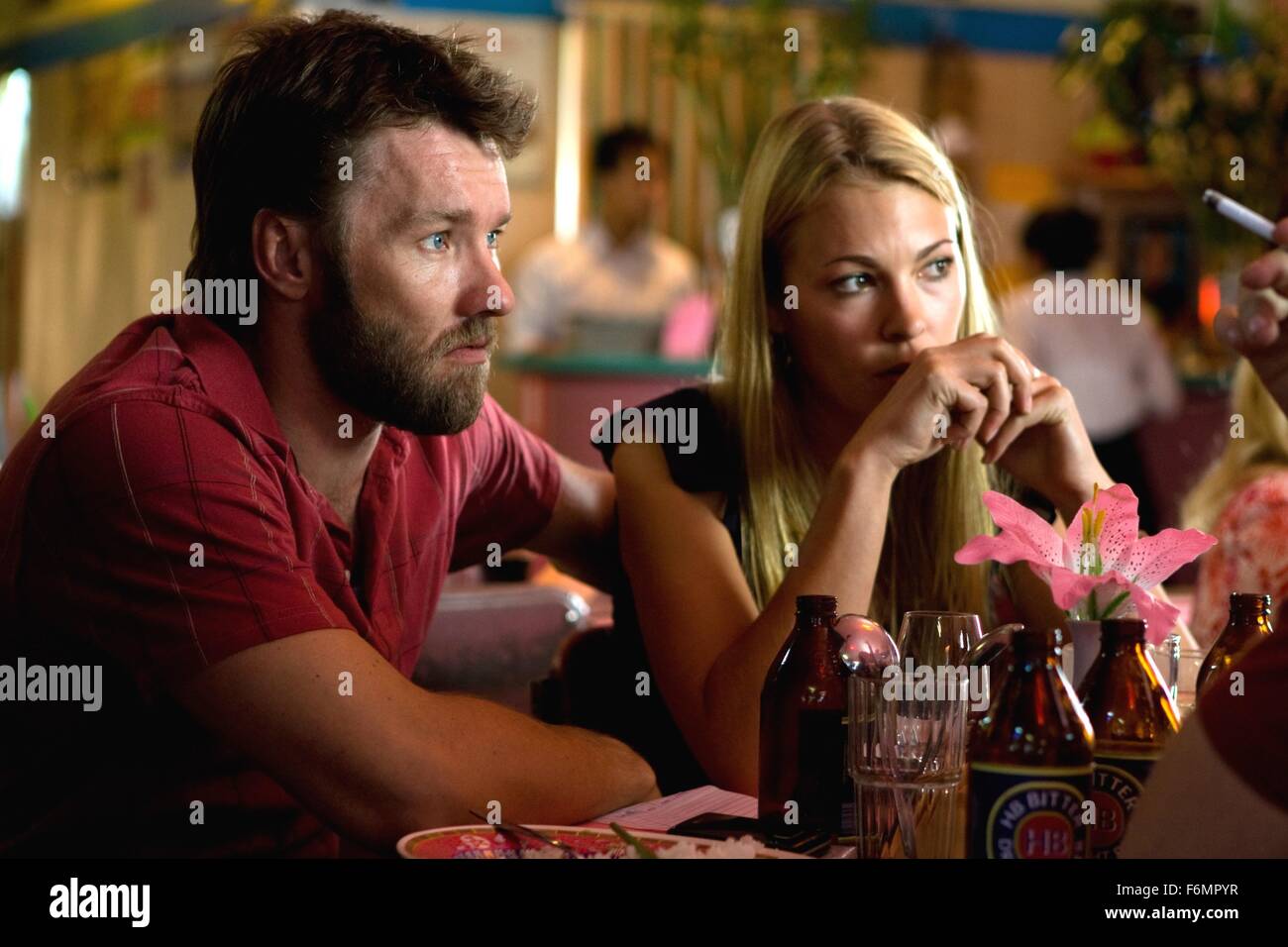 RELEASE DATE: 13 August 2010. MOVIE TITLE: Animal Kingdom. STUDIO: Porchlight Films. PLOT: Tells the story of seventeen year-old J (Josh) as he navigates his survival amongst an explosive criminal family and the detective who thinks he can save him. PICTURED: JOEL EDGERTON as Barry Brown and MIRRAH FOULKES as Catherine Brown. Stock Photo