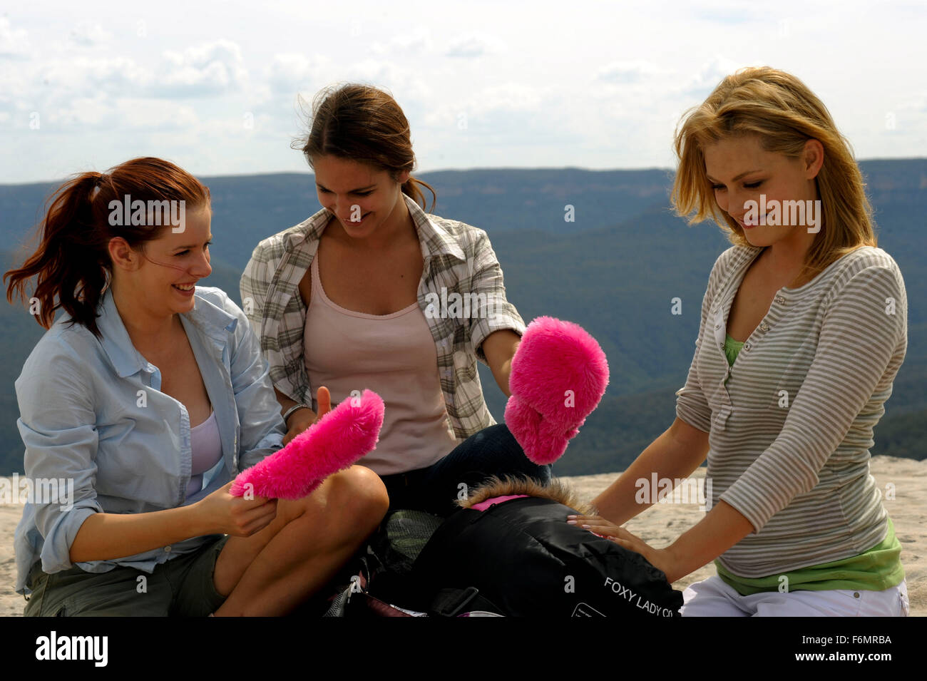 RELEASE DATE: September 2, 2010. MOVIE TITLE: Tomorrow, When the War Began. STUDIO: Ambience Entertainment. PLOT: When their country is invaded and their families are taken, eight unlikely high school teenagers band together to fight. PICTURED: CAITLIN STASEY as Ellie Linton, RACHEL HURD-WOOD as Corrie Mackenzie and PHOEBE TONKIN as Fiona Maxwell. Stock Photo