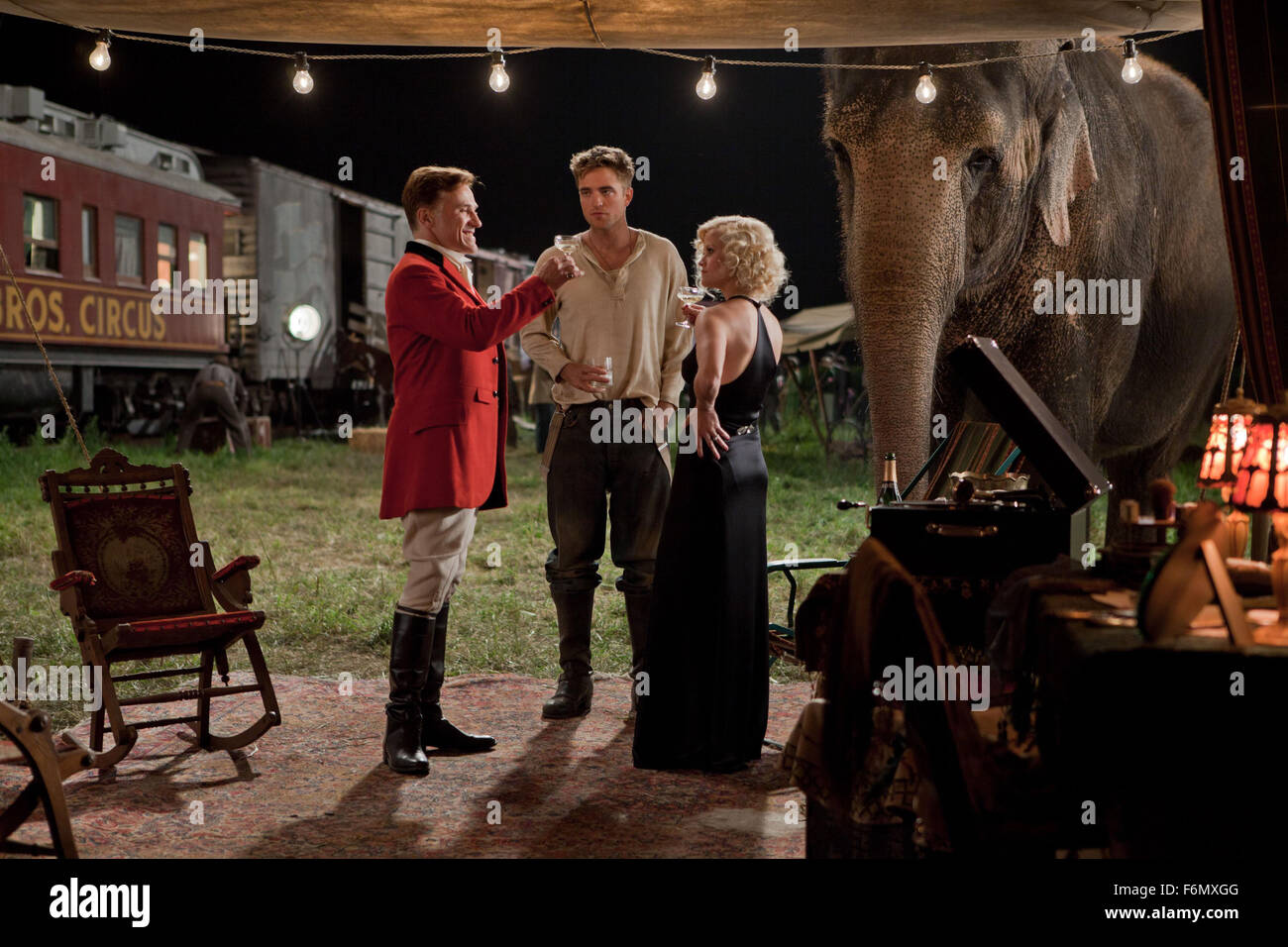 RELEASE DATE: April 22, 2011  MOVIE TITLE: Water for Elephants  STUDIO: 3 Arts Entertainment  DIRECTOR: Francis Lawrence  PLOT: A veterinary student abandons his studies after his parents are killed and joins a traveling circus as their vet  PICTURED: ROBERT PATTINSON as Jacob Jankowski, REESE WITHERSPOON as Marlena Rosenbluth, CHRISTOPH WALTZ as August Rosenbluth  (Credit Image: c 3 Arts Entertainment/Entertainment Pictures) Stock Photo