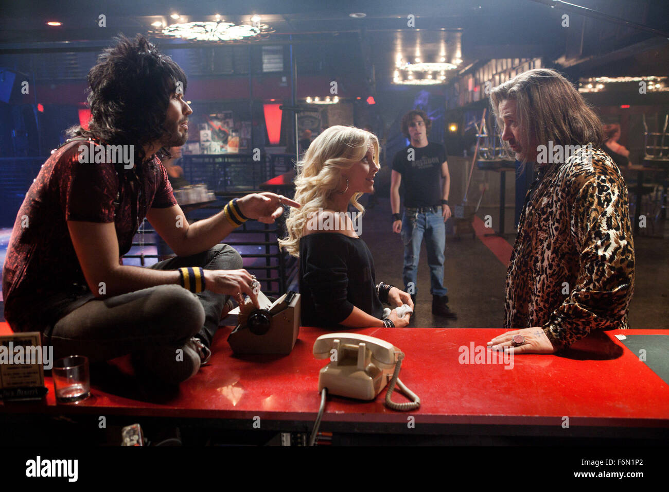 RELEASE DATE: June 1, 2012   MOVIE TITLE: Rock of Ages   STUDIO: Offspring Entertainment   DIRECTOR: Adam Shankman  PLOT: A small-town girl arrives in Hollywood at the height of the 1980s rock-music scene   PICTURED: (L-R) RUSSELL BRAND as Lonny, JULIANNE HOUGH as Sherrie Christian, DIEGO BONETA as Drew Boley, and ALEC BALDWIN as Dennis Dupree   (Credit Image: c Offspring Entertainment/Entertainment Pictures) Stock Photo