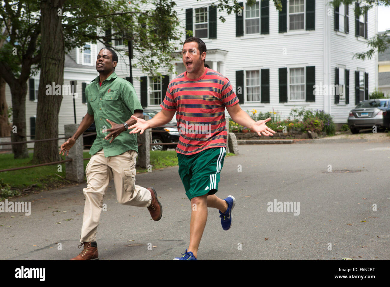 RELEASE DATE: July 12, 2013 TITLE: Grown Ups 2 STUDIO: Columbia Pictures DIRECTOR: Dennis Dugan PLOT: After moving his family back to his hometown to be with his friends and their kids, Lenny (Adam Sandler), finds out that between old bullies, new bullies, schizo bus drivers, drunk cops on skis, and 400 costumed party crashers sometimes crazy follows you PICTURED: CHRIS ROCK as Kurt McKenzie and ADAM SANDLER as Lenny Feder (Credit: c Columbia Pictures/Entertainment Pictures) Stock Photo