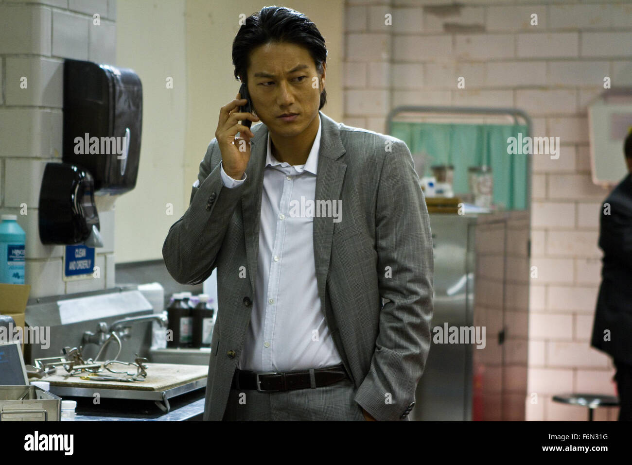 RELEASE DATE: February 1, 2013 TITLE: Bullet To The Head aka Shootout STUDIO: Dark Castle Entertainment DIRECTOR: Walter Hill PLOT: After watching their respective partners die, a New Orleans hitman and a Washington D.C. detective form an alliance in order to bring down their common enemy PICTURED: SUNG KANG as Detective Taylor Kwon (Credit: c Dark Castle Entertainment/Entertainment Pictures) Stock Photo