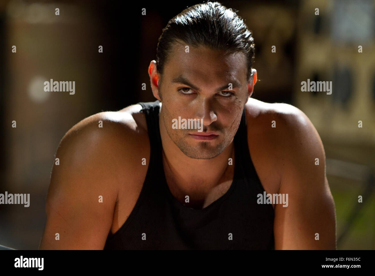 RELEASE DATE: February 1, 2013 TITLE: Bullet To The Head aka Shootout STUDIO: Dark Castle Entertainment DIRECTOR: Walter Hill PLOT: After watching their respective partners die, a New Orleans hitman and a Washington D.C. detective form an alliance in order to bring down their common enemy PICTURED: JASON MOMOA as Keegan (Credit: c Dark Castle Entertainment/Entertainment Pictures) Stock Photo