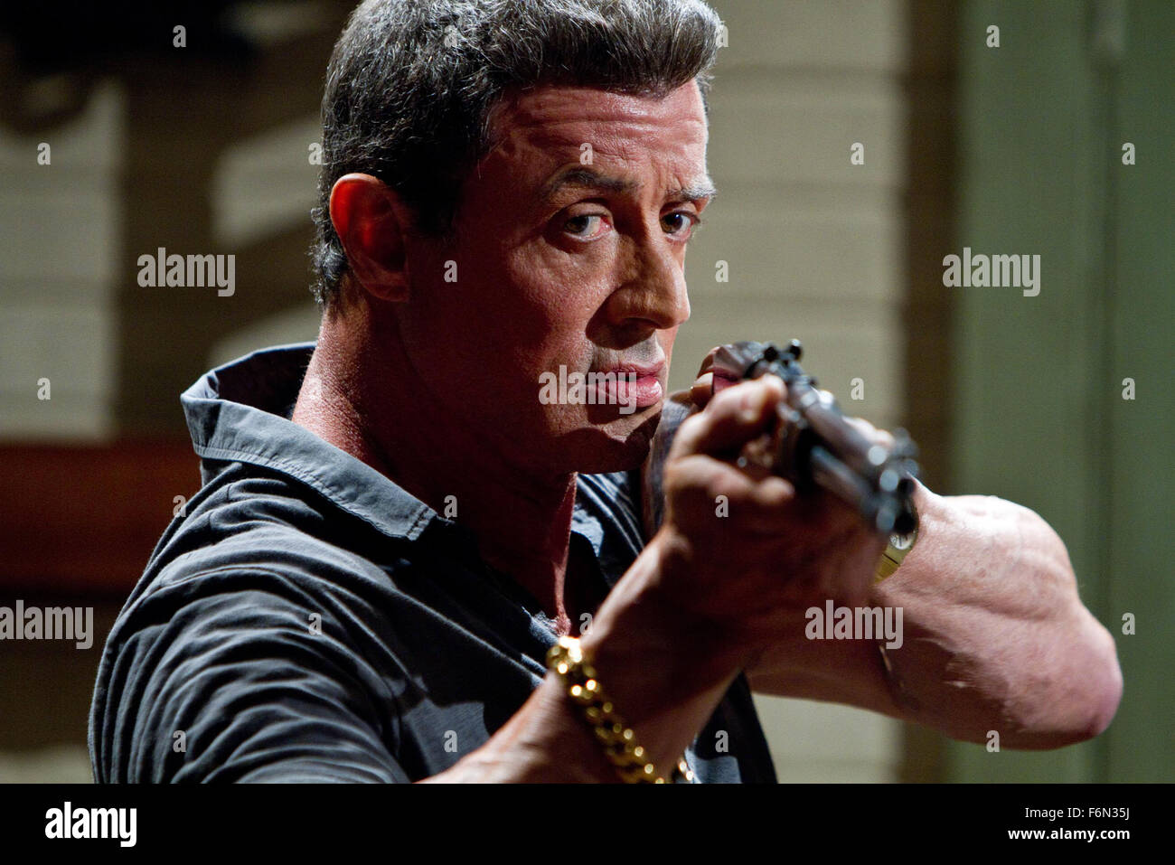 RELEASE DATE: February 1, 2013 TITLE: Bullet To The Head aka Shootout STUDIO: Dark Castle Entertainment DIRECTOR: Walter Hill PLOT: After watching their respective partners die, a New Orleans hitman and a Washington D.C. detective form an alliance in order to bring down their common enemy PICTURED: SYLVESTER STALLONE as Jimmy Bobo (Credit: c Dark Castle Entertainment/Entertainment Pictures) Stock Photo