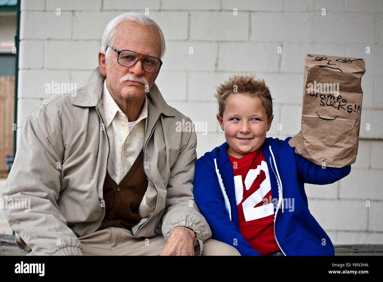 RELEASE DATE: October 25, 2013 TITLE: Jackass Presents: Bad Grandpa STUDIO: Paramount Pictures MTV Films DIRECTOR: Jeff Tremaine PLOT: 86-year-old Irving Zisman takes a trip from Nebraska to North Carolina to take his 8 year-old grandson, Billy, back to his real father PICTURED: JOHNNY KNOXVILLE as Irving Zisman and JACKSON NICOLL as Billy (Credit: c Paramount Pictures/Entertainment Pictures) Stock Photo