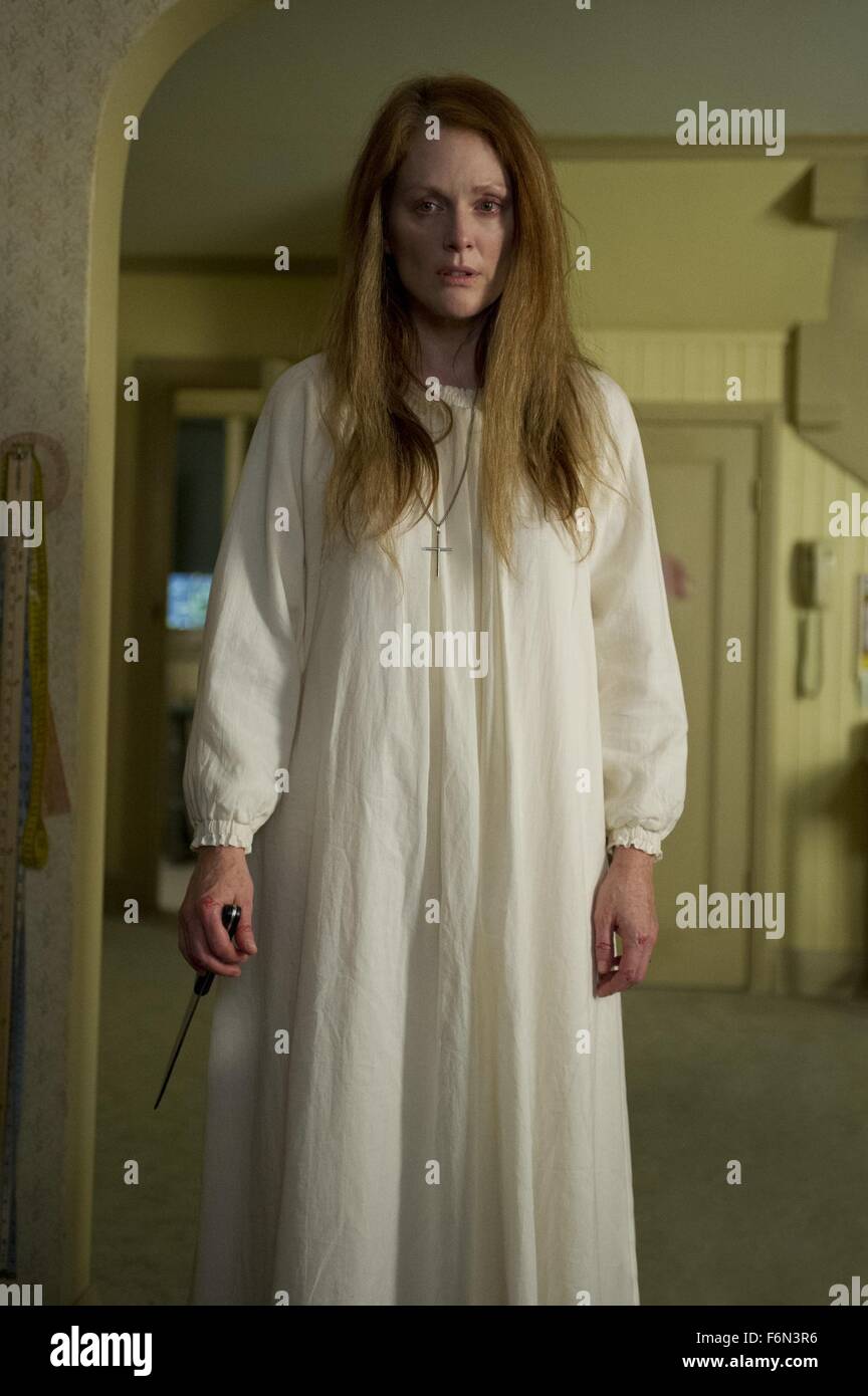 RELEASE DATE: October 18, 2013.TITLE: Carrie.STUDIO: MGM.DIRECTOR: Kimberly Peirce.PLOT: A sheltered high school girl unleashes her newly developed telekinetic powers after she is pushed too far by her peers.PICTURED: JULIANNE MOORE as Margaret White.(Credit: c MGM/Entertainment Pictures) Stock Photo