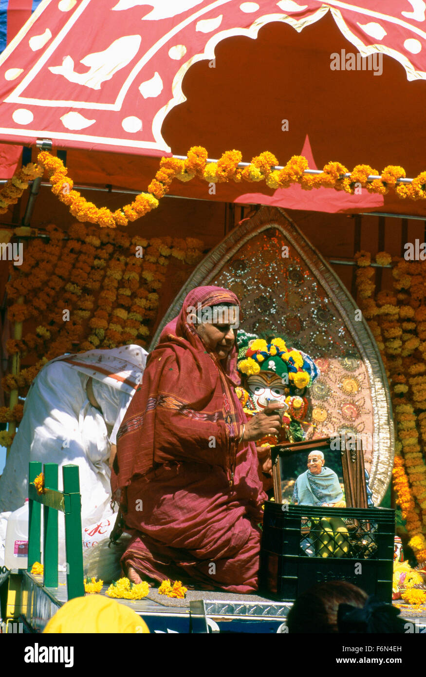 Hare Krishna Chariot Parade and Festival of India, Vancouver, BC, British Columbia, Canada - Devotee worshiping Swami Prabhupada Stock Photo