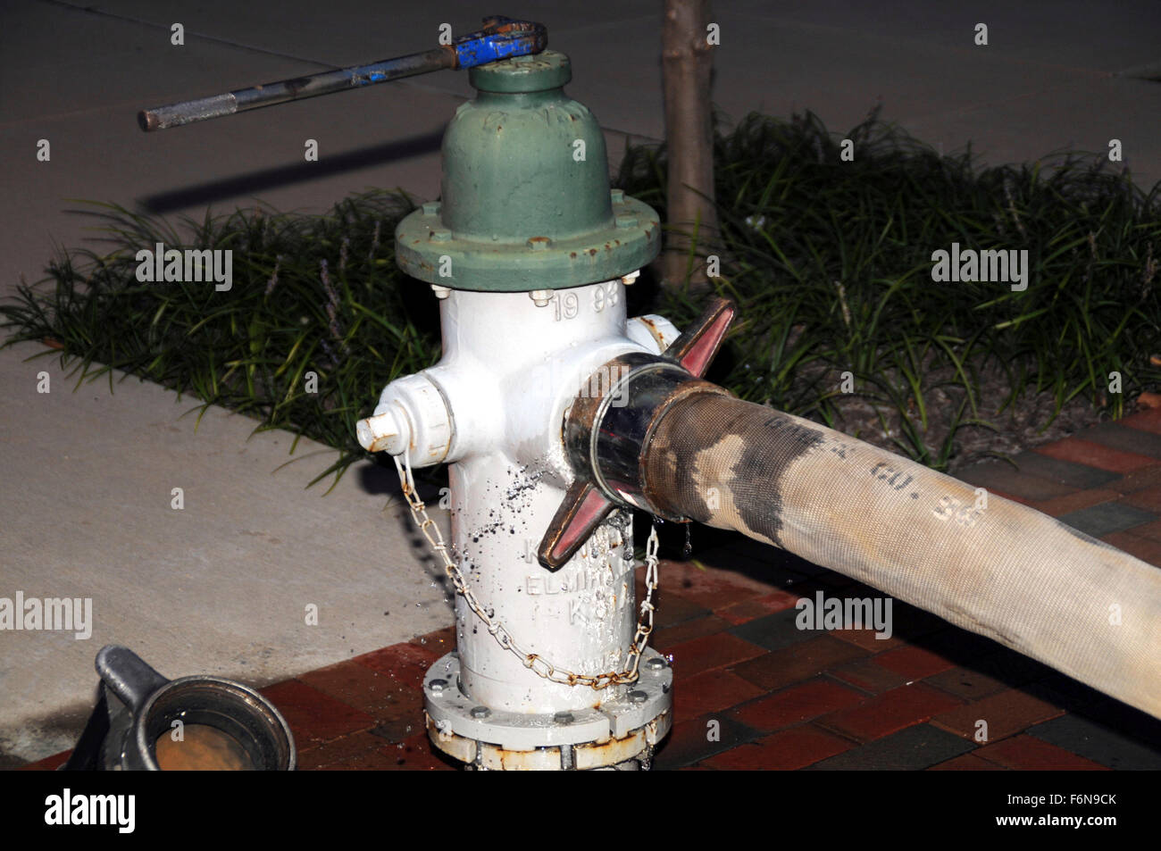 Fire hydrant fire hose connected hi-res stock photography and images - Alamy