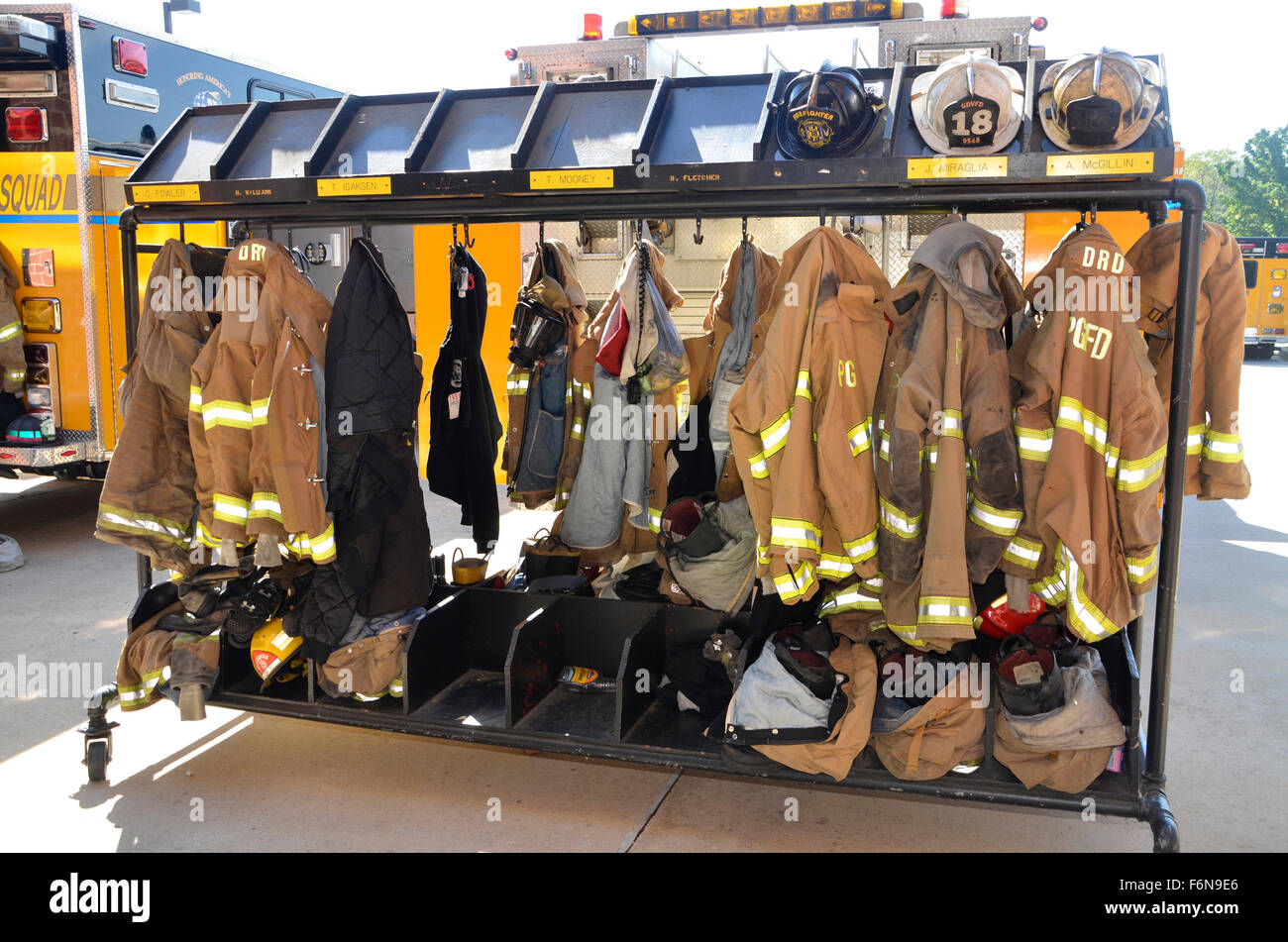 firefighters turnout gear hanging on racks Stock Photo 90208222 Alamy