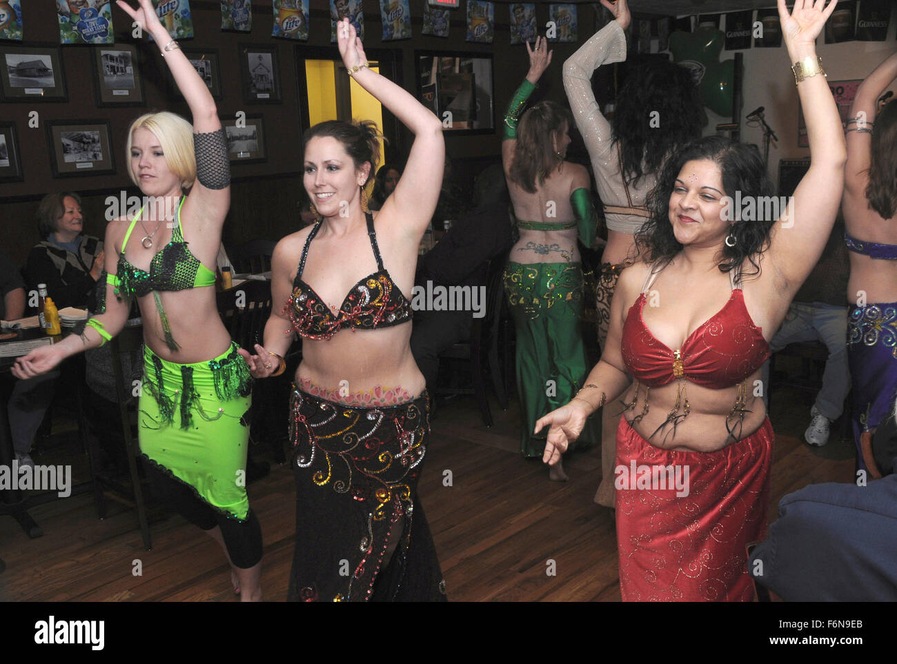 Belly dancers dance at a retirement party in Bowie, Maryland Stock Photo