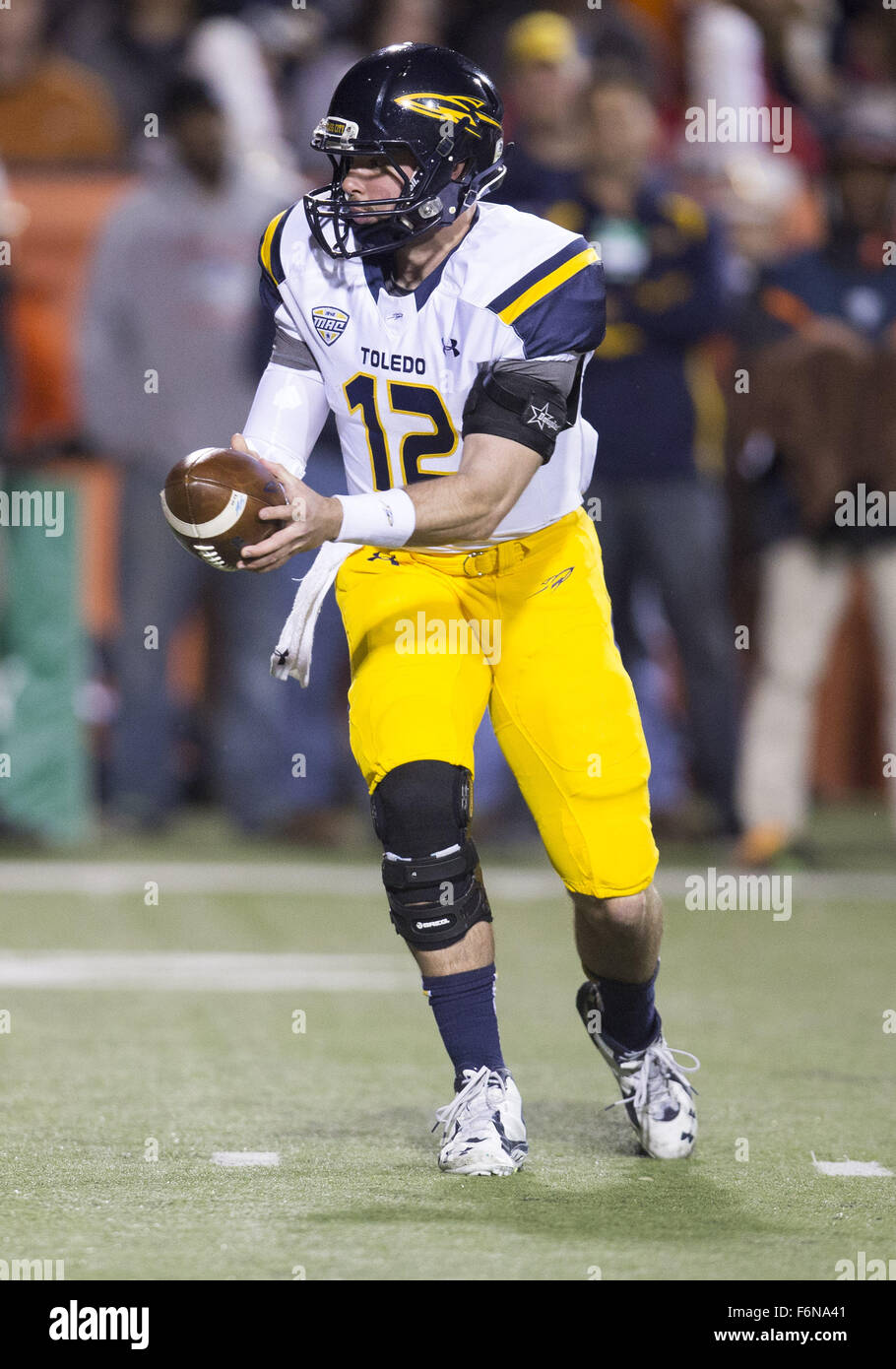 Bowling Green, Ohio, USA. 17th Nov, 2015. Toledo quarterback Phillip Ely (12) during NCAA football game action between the Toledo Rockets and the Bowling Green Falcons at Doyt L. Perry Stadium in Bowling Green, Ohio. Toledo defeated Bowling Green 44-28. John Mersits/CSM/Alamy Live News Stock Photo