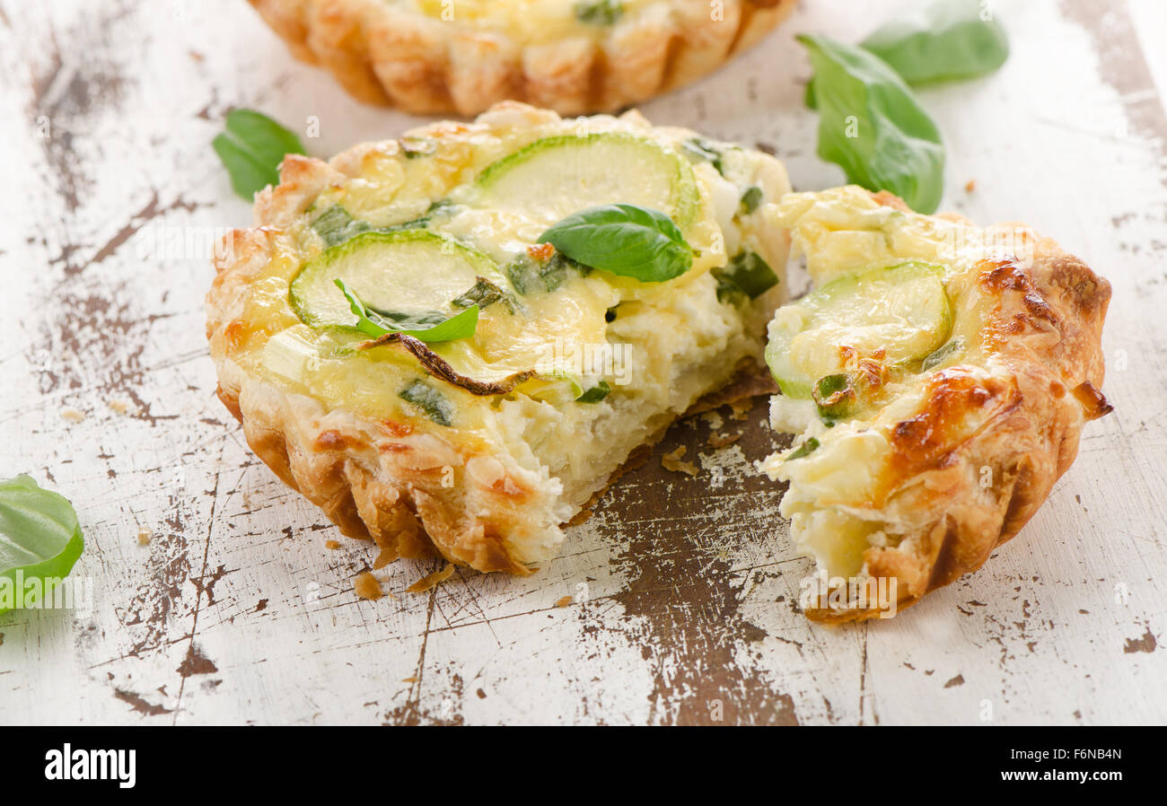 Tart with cheese on wooden background. Selective focus Stock Photo