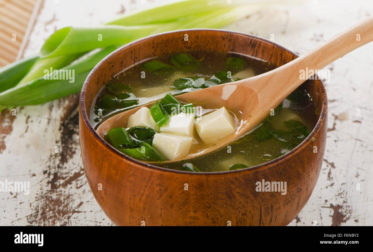 Miso soup on white wooden table. Selective focus Stock Photo