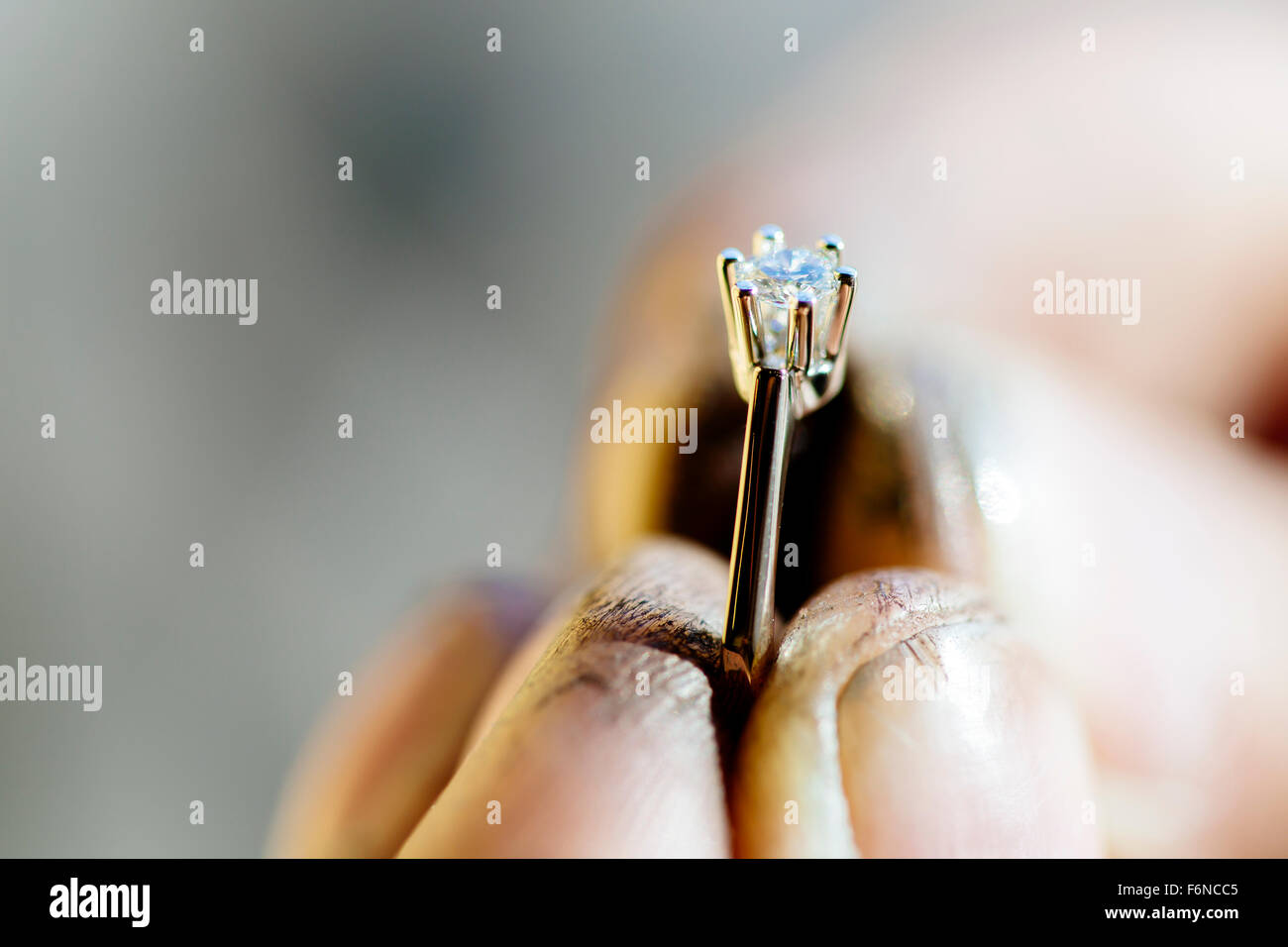 Jeweler Polishing A Ring Stock Photo - Download Image Now - Jewelry,  Polishing, Shiny - iStock
