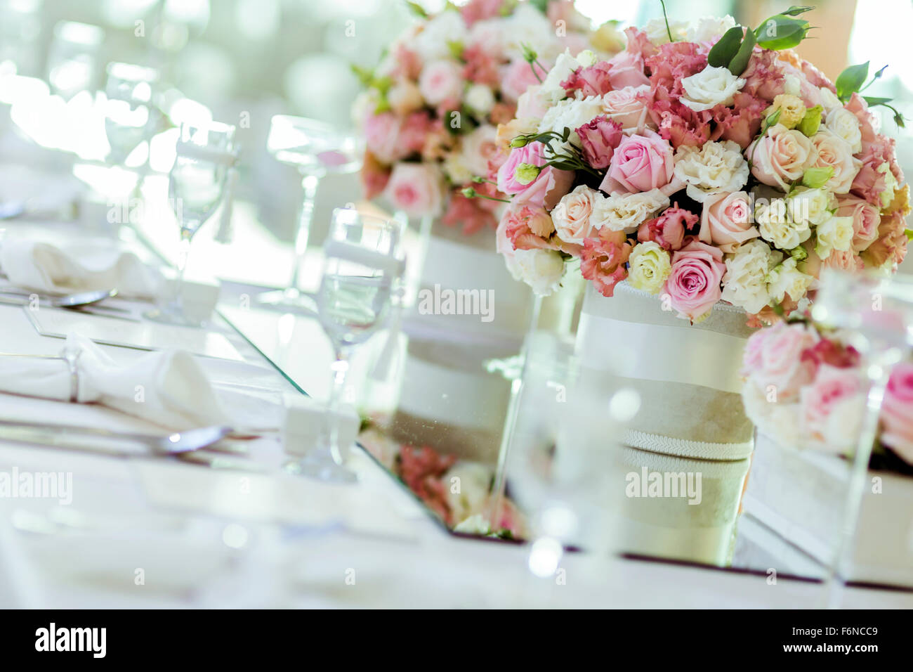 Beautiful wedding decoration with roses and a luxurious table ... Beautiful wedding decoration with roses and a luxurious table ...