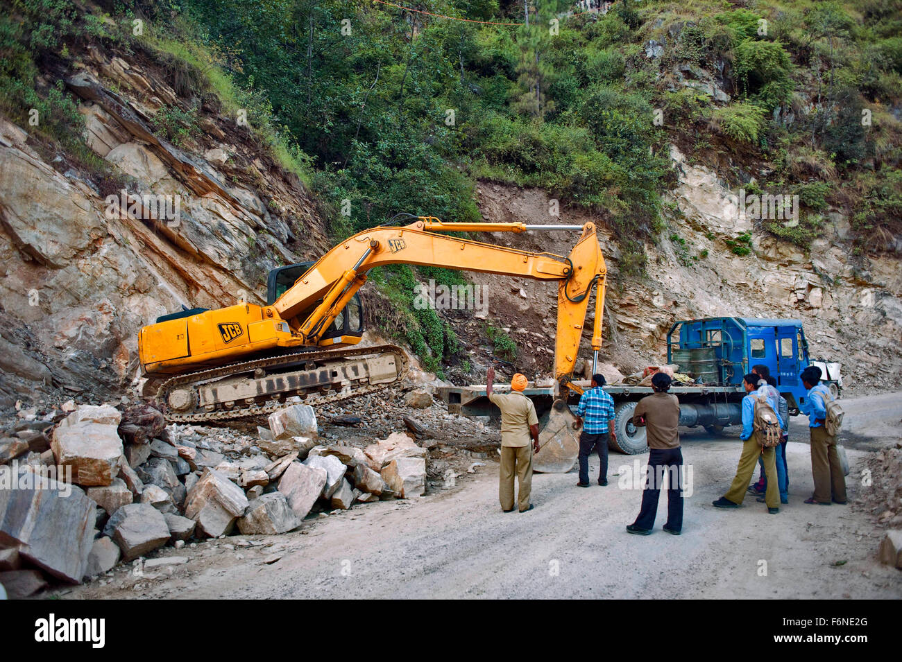 Hydraulic excavator on road, uttarakhand, india, asia Stock Photo