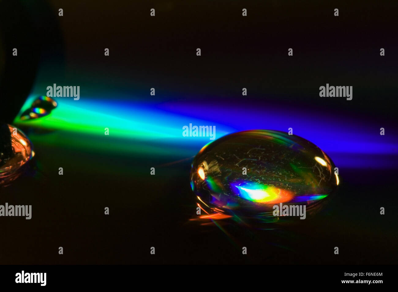 abstract rainbow drop in a plastic cd material Stock Photo - Alamy