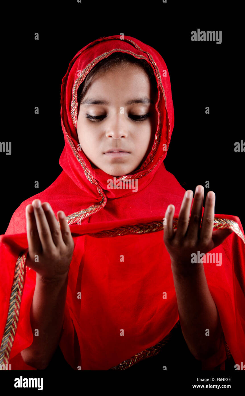 Muslim girl praying, MR#786 Stock Photo