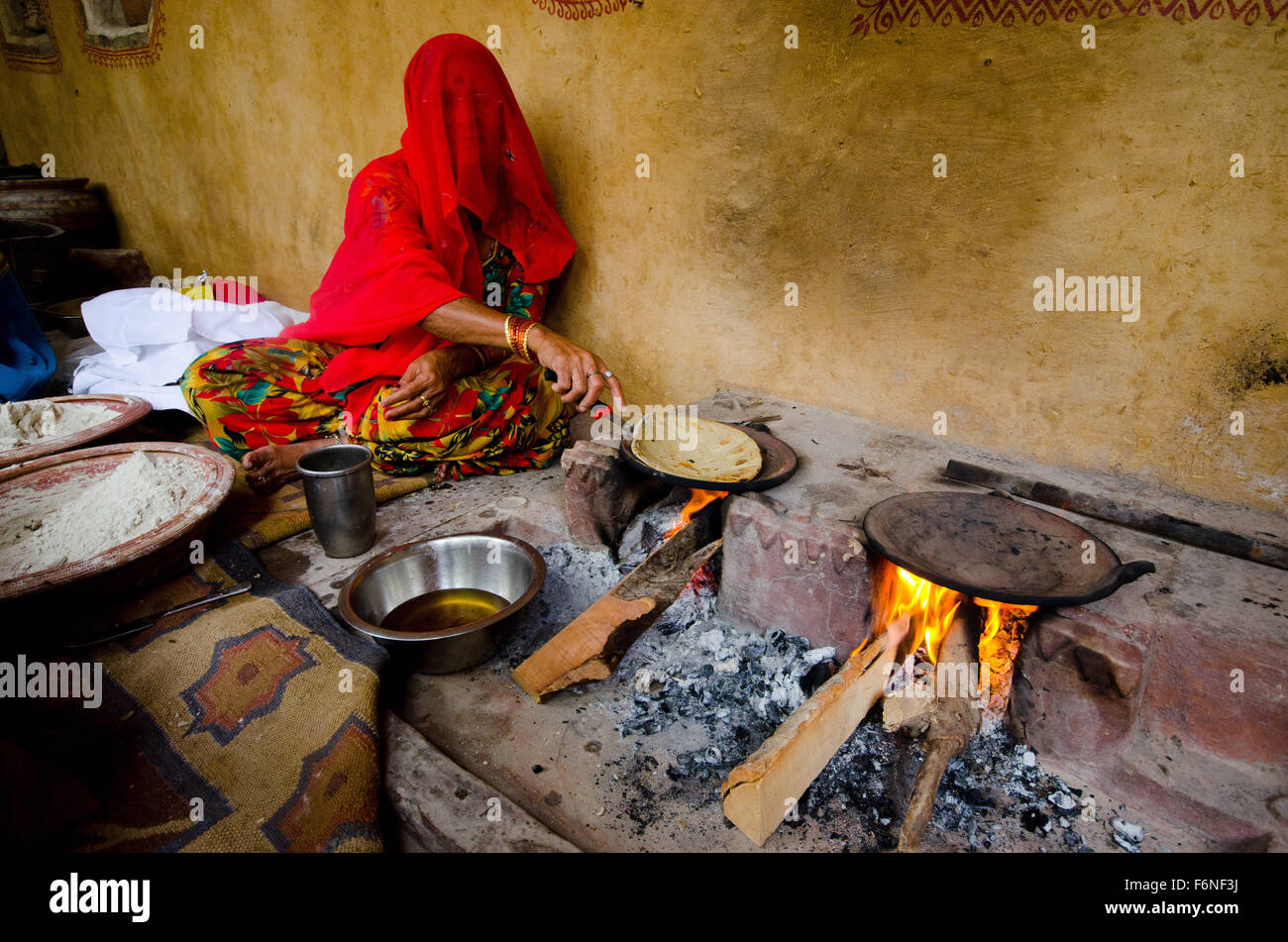Village woman making bread stove, jodhpur, rajasthan, india, asia Stock