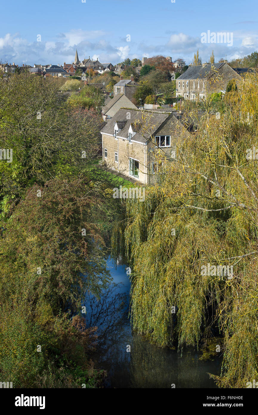 River Avon flowing through lush woodland on the fringe of Malmesbury Wiltshire UK Stock Photo
