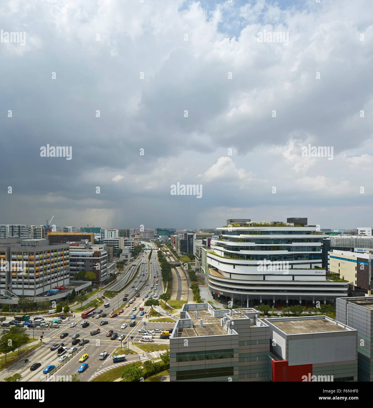 Elevated view of major intersection with corporate buildings. BreadTalk IHQ, Singapore, Singapore. Architect: Kay Ngeee Tan Arch Stock Photo