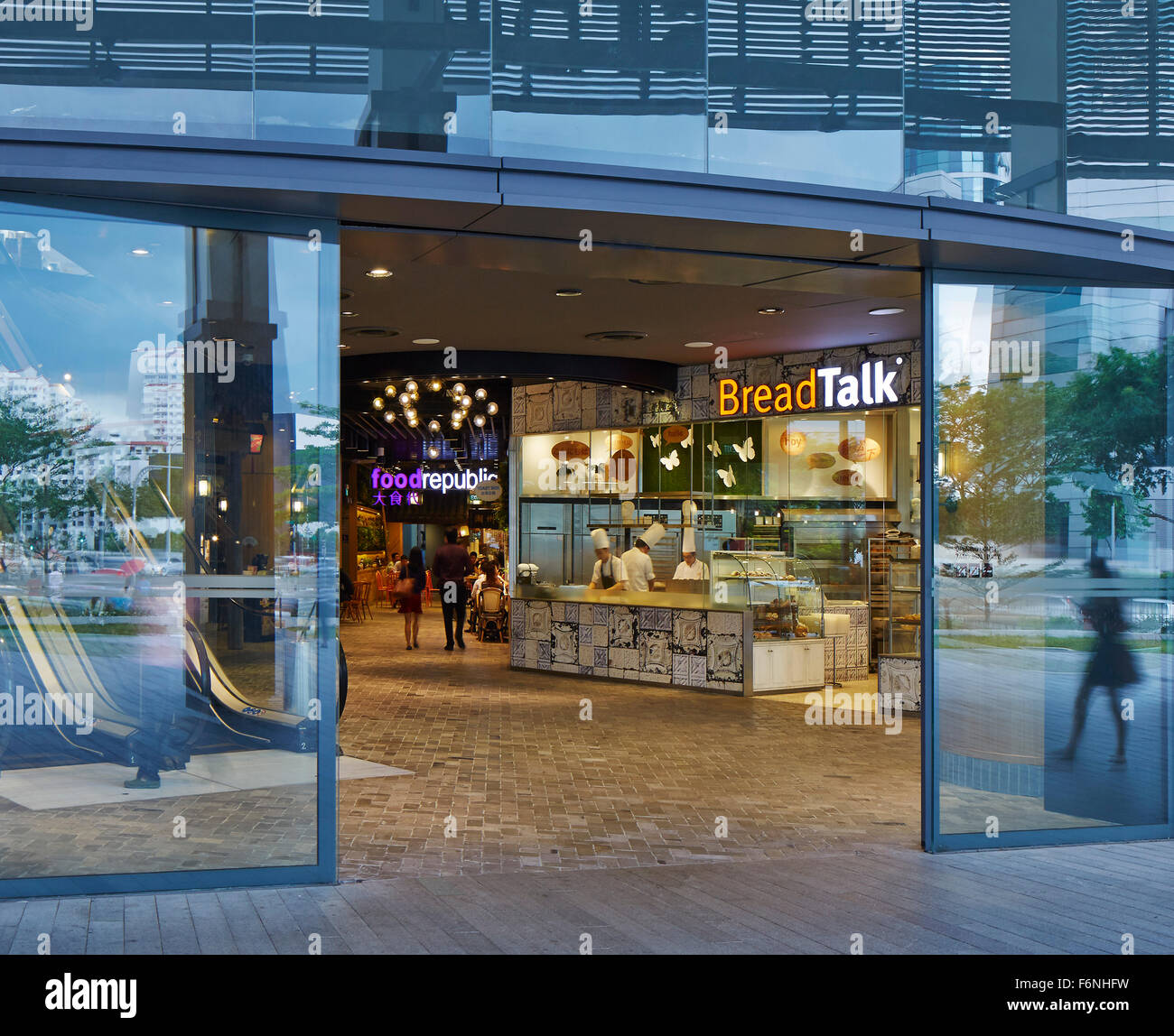 Main entrance to food and retail area. BreadTalk IHQ, Singapore, Singapore. Architect: Kay Ngeee Tan Architects, 2014. Stock Photo