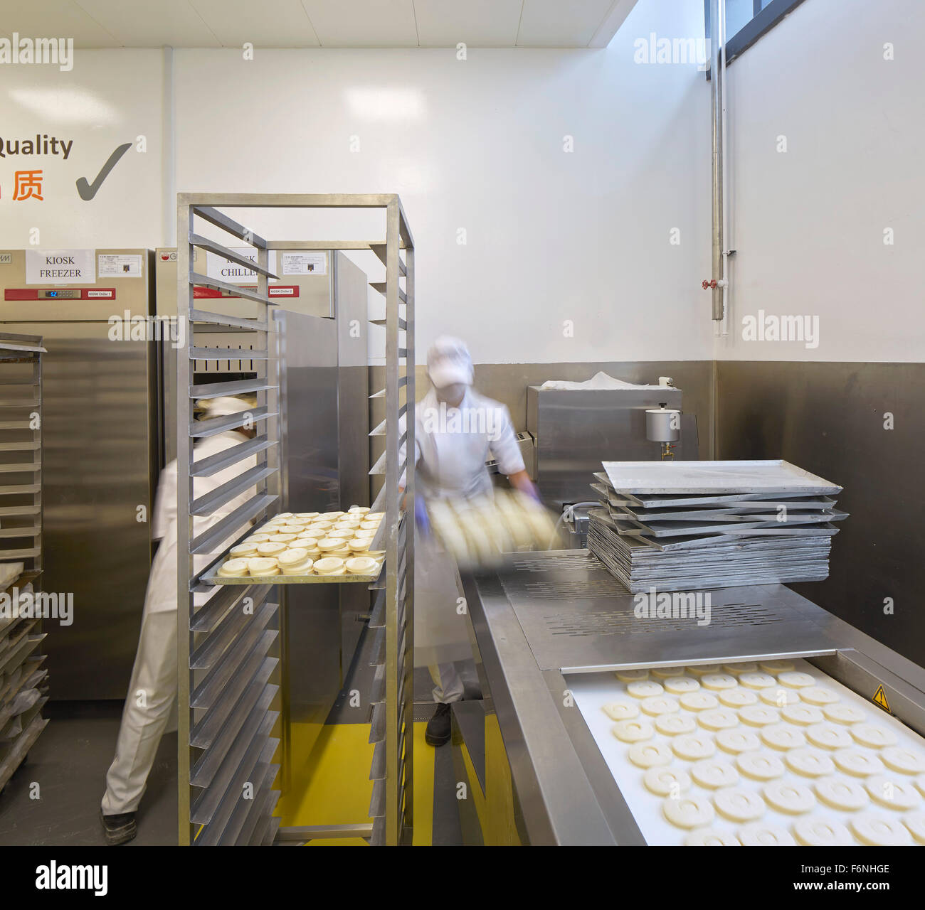 Industrial bakery with production line. BreadTalk IHQ, Singapore, Singapore. Architect: Kay Ngeee Tan Architects, 2014. Stock Photo