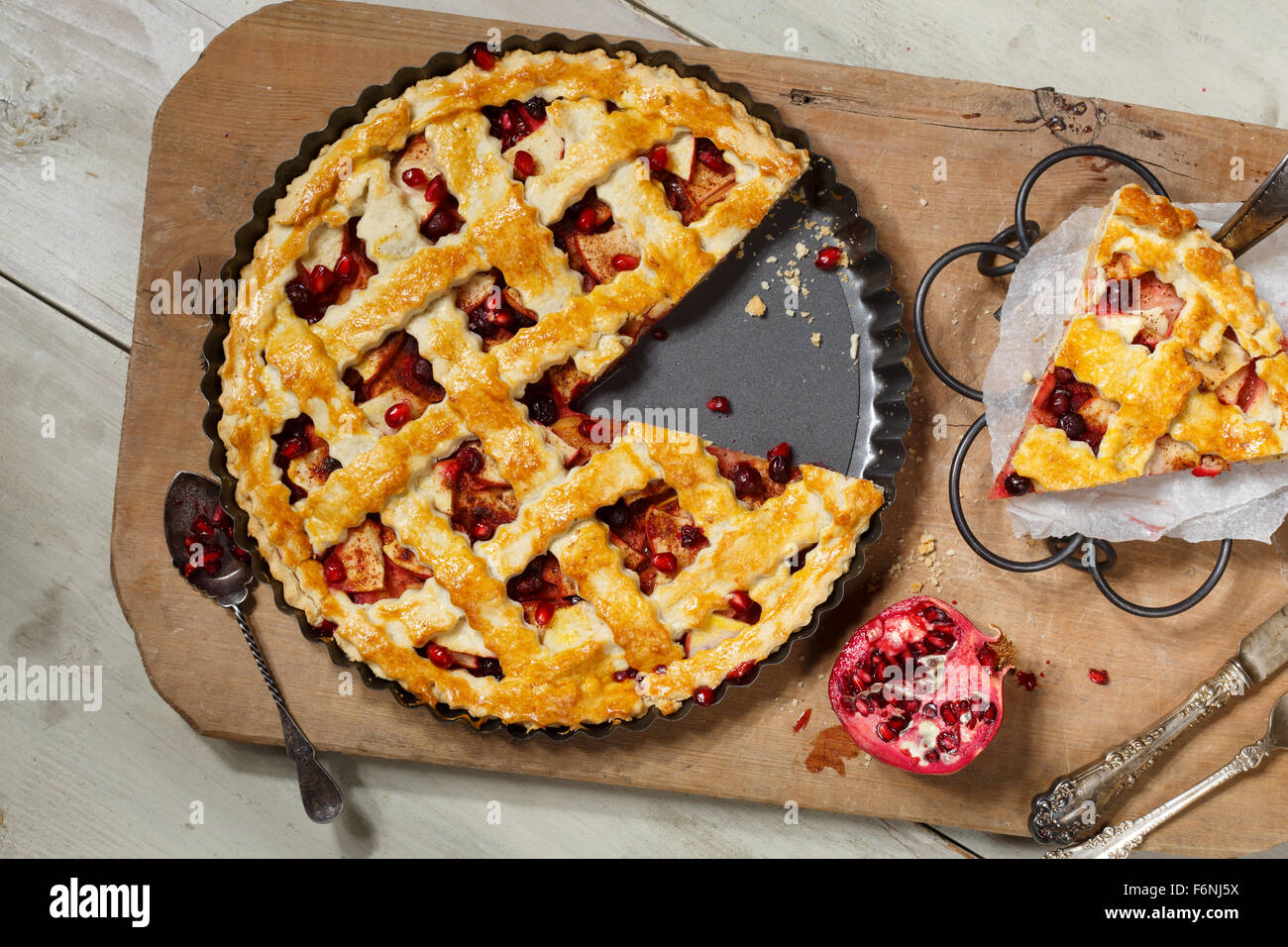 American pie with apple,foxberry and pomegranate seeds ingredient Stock Photo