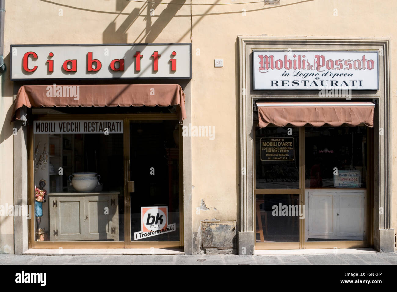 used antique and restored furniture store in Florence, Italy Stock
