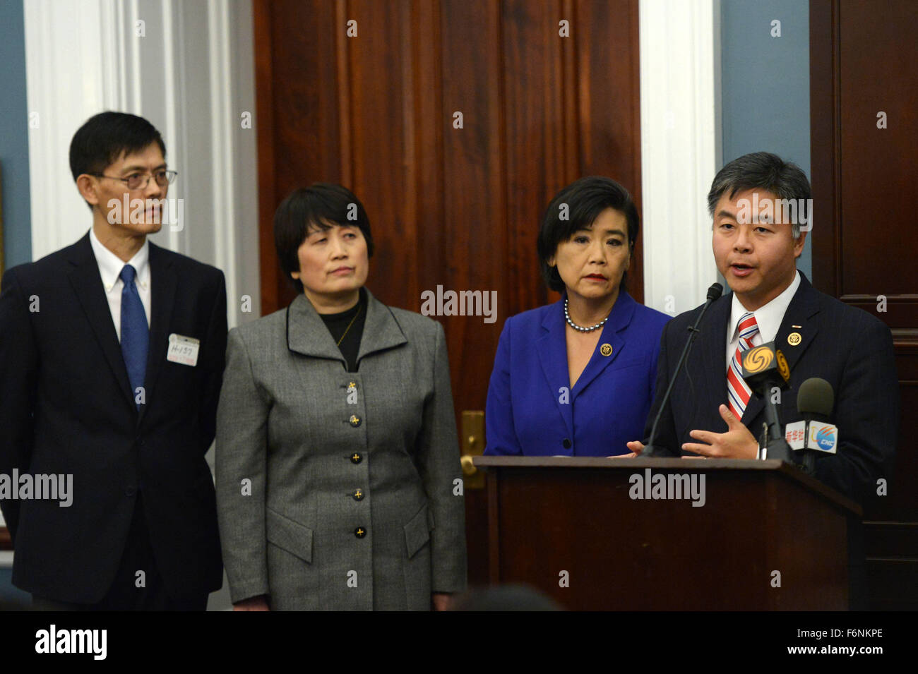Washington DC, USA. 17th Nov, 2015. (L-R) Temple University professor Xiaoxing Xi, National Weather Service hydrologist Sherry Chen, lawmakers Judy Chu and Ted Lieu attend a press conference in Washington, DC, the United States, Nov. 17, 2015. Four U.S. lawmakers on Tuesday urged the country's Department of Justice (DOJ) to investigate whether race, ethnicity or national origin played a part in the recent cases against Chinese-American scientists who were wrongfully suspected of economic espionage. Credit:  Yin Bogu/Xinhua/Alamy Live News Stock Photo