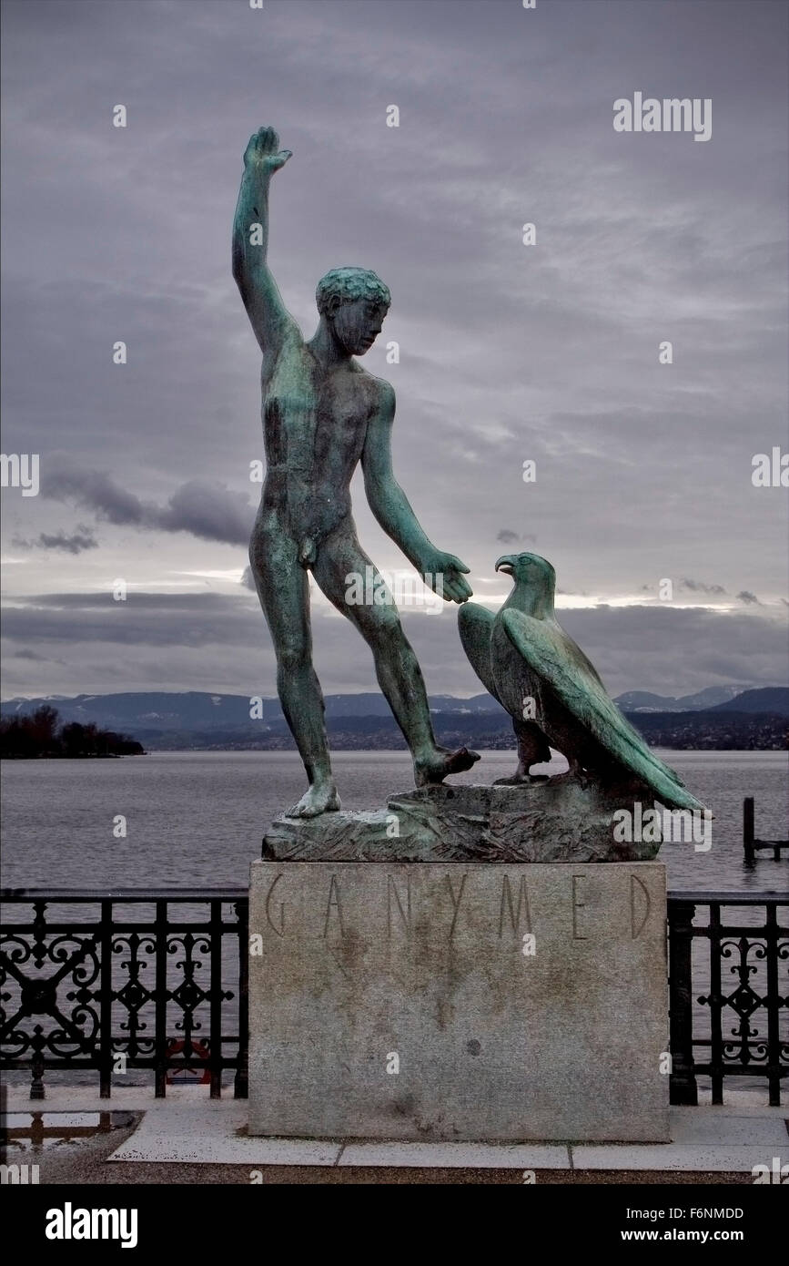 statue of a man and a eagle near the lake of costanza in zurich swisse Stock Photo