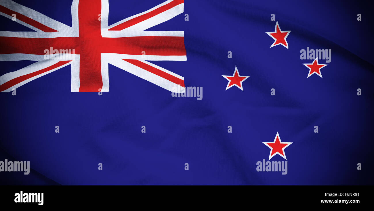 Wavy and rippled national flag of New Zealand background. Stock Photo