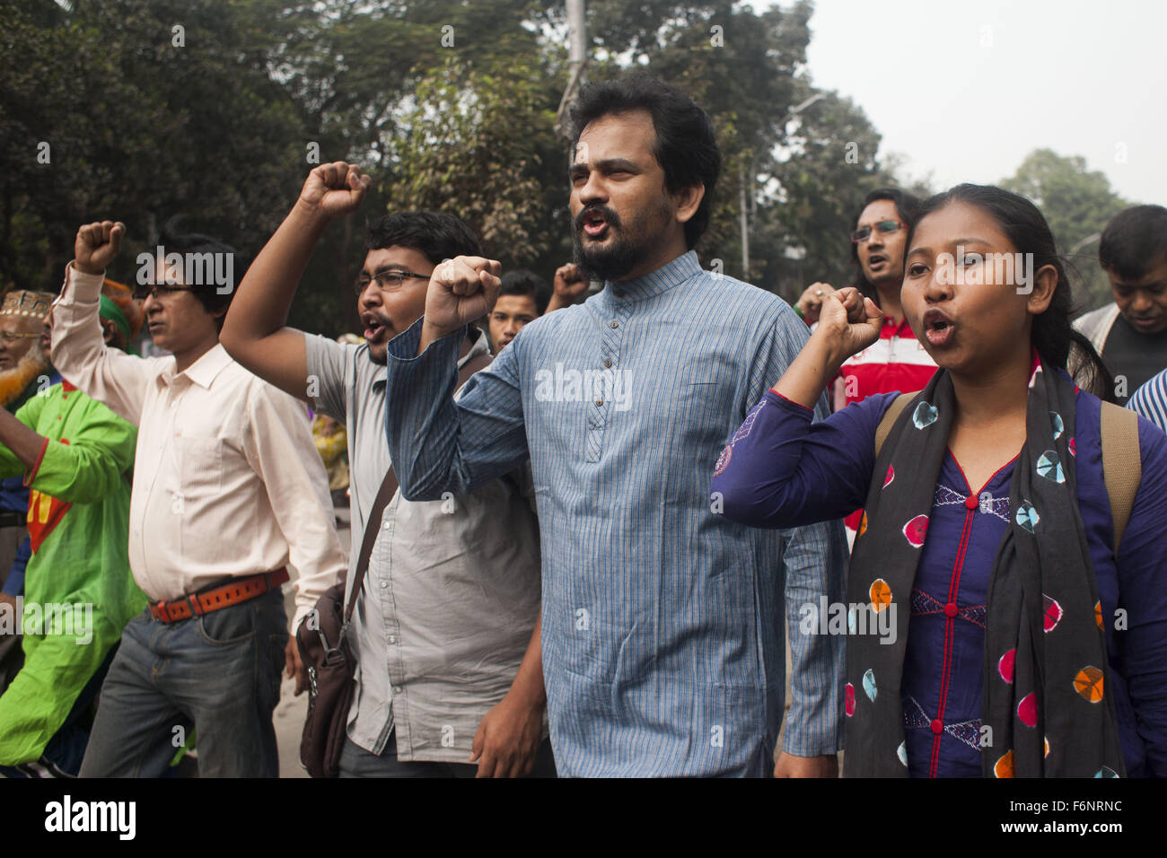 Dhaka, Bangladesh. 18th Nov, 2015. Bangladeshi Social activist bring out procession following the sentencing of war-crime convicts Ali Ahsan Mohammad Mujahid and Salauddin Quader Chowdhury. The Supreme Court has upheld the death sentences of war-crime convicts Ali Ahsan Mohammad Mujahid and Salauddin Quader Chowdhury. Salauddin Quader, infamous as Chittagong's wartime terror, was sentenced to death by a war crimes tribunal on Oct 1, 2013 for his role in the mass killing and torture of Hindus and Awami League supporters. Credit:  ZUMA Press, Inc./Alamy Live News Stock Photo