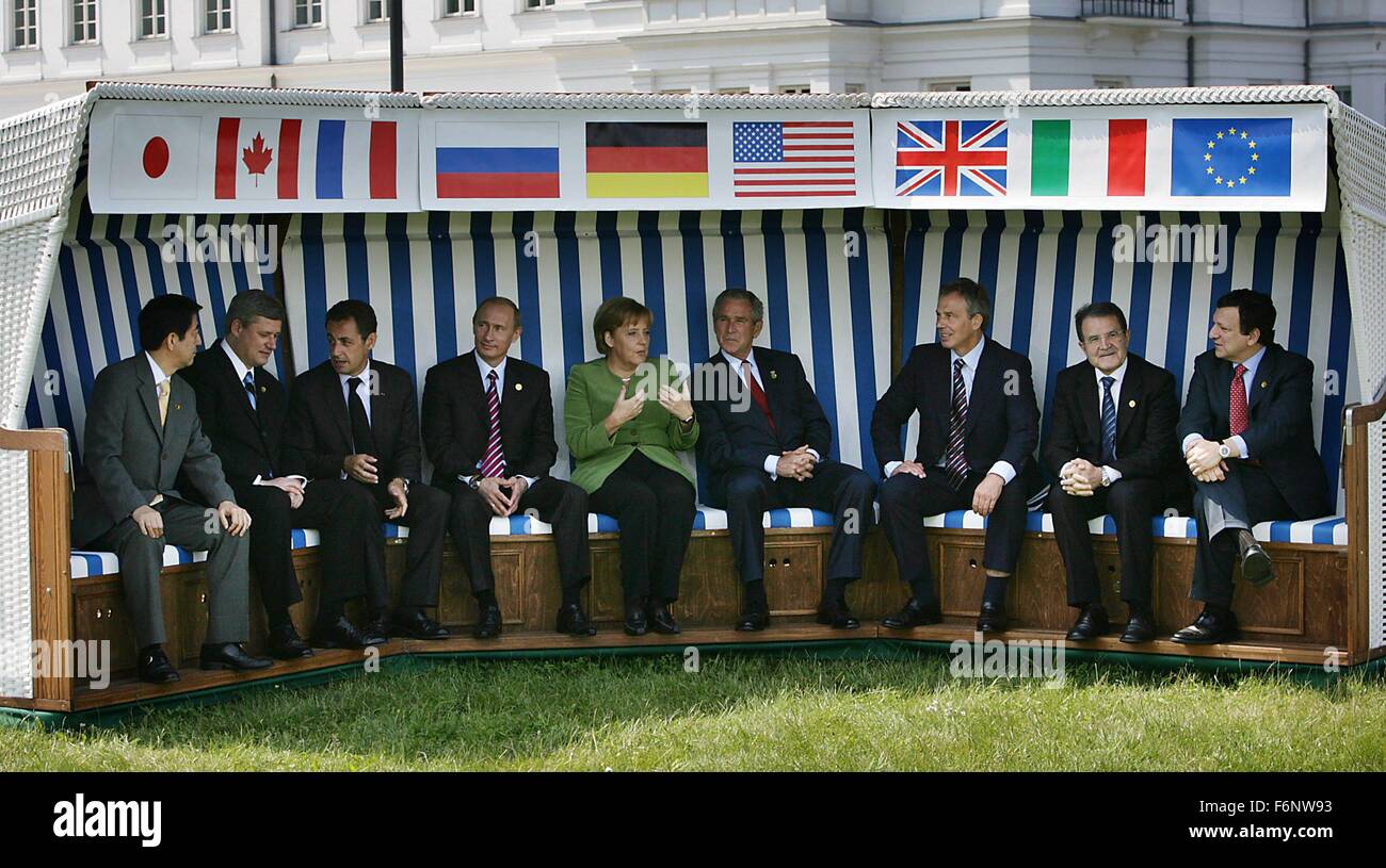 FILE - An archive picture dated 7 June 2007 shows the leaders of the G8 states sitting together in a large wicker beach chair during the G8 Summit in Heiligendamm, Germany. Japanese Prime Minister Shinzo Abe (L-R), Canadian Prime Minister Stephen Harper, French President  Nicolas Sarkozy, Russian President  Vladimir Putin, German Chancellor  Angela Merkel, US President George W. Bush, British Prime Minister Tony Blair, Italien Prime Minister Romano Prodi  and President of the European  Commission Jose Manuel Barroso. Photo: Oliver Berg / dpa Stock Photo