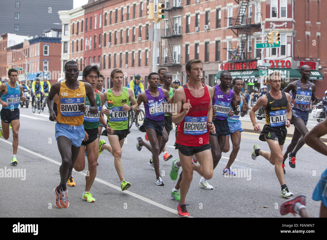 Front runners in the NYC Marathon 2015 along 4th Ave. in Brooklyn with Stanley Biwott (left) of Kenya the eventual winner. Stock Photo