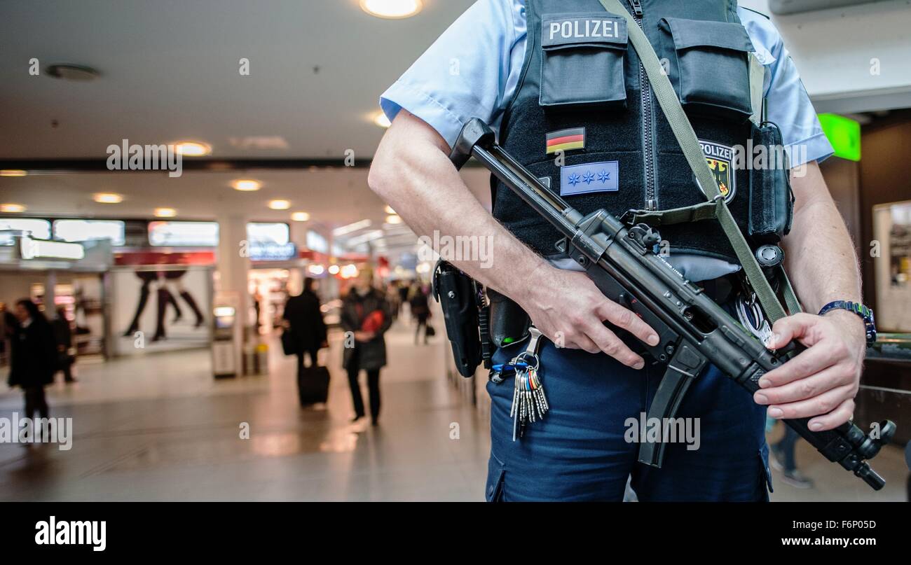 A heavily armed police officer stands in Berlin's Tegel airport