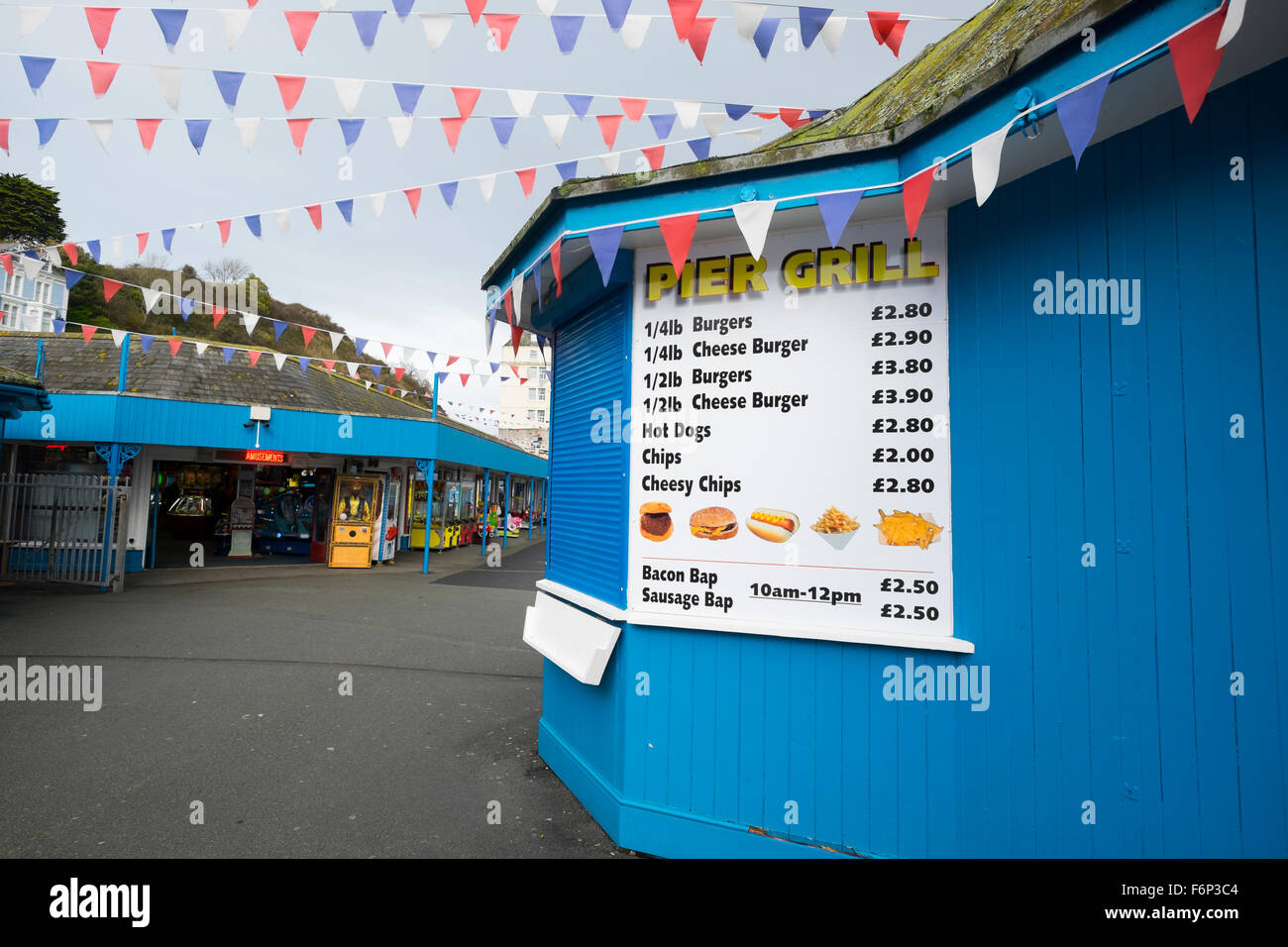 Pier Grill stall menu sign on Llandudno Pier, Conwy, Wales Stock Photo