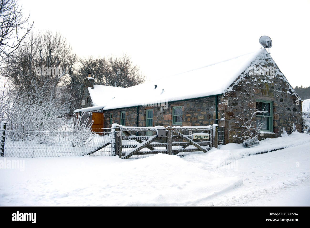 A remote converted steading in Scotland caught in winters grip of snow and ice Stock Photo
