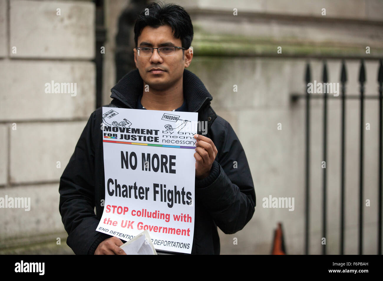 London, UK. 18th Nov, 2015. An activist from Movement for Justice protests outside the Nigerian High Commission in London against chartered deportation flights to Nigeria. Credit:  Mark Kerrison/Alamy Live News Stock Photo