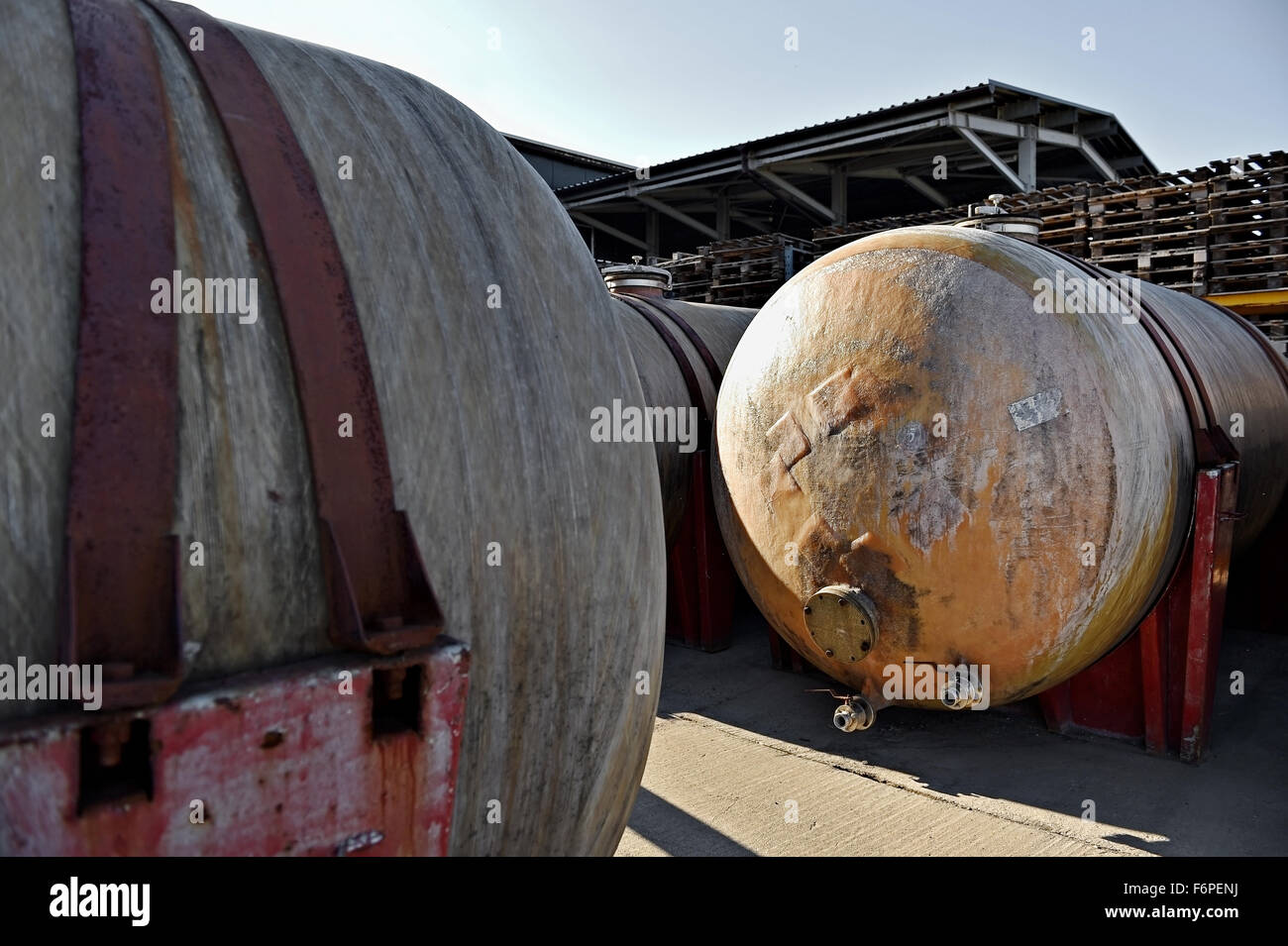 Industrial detail with big fiber glass tanks for wine storage Stock Photo